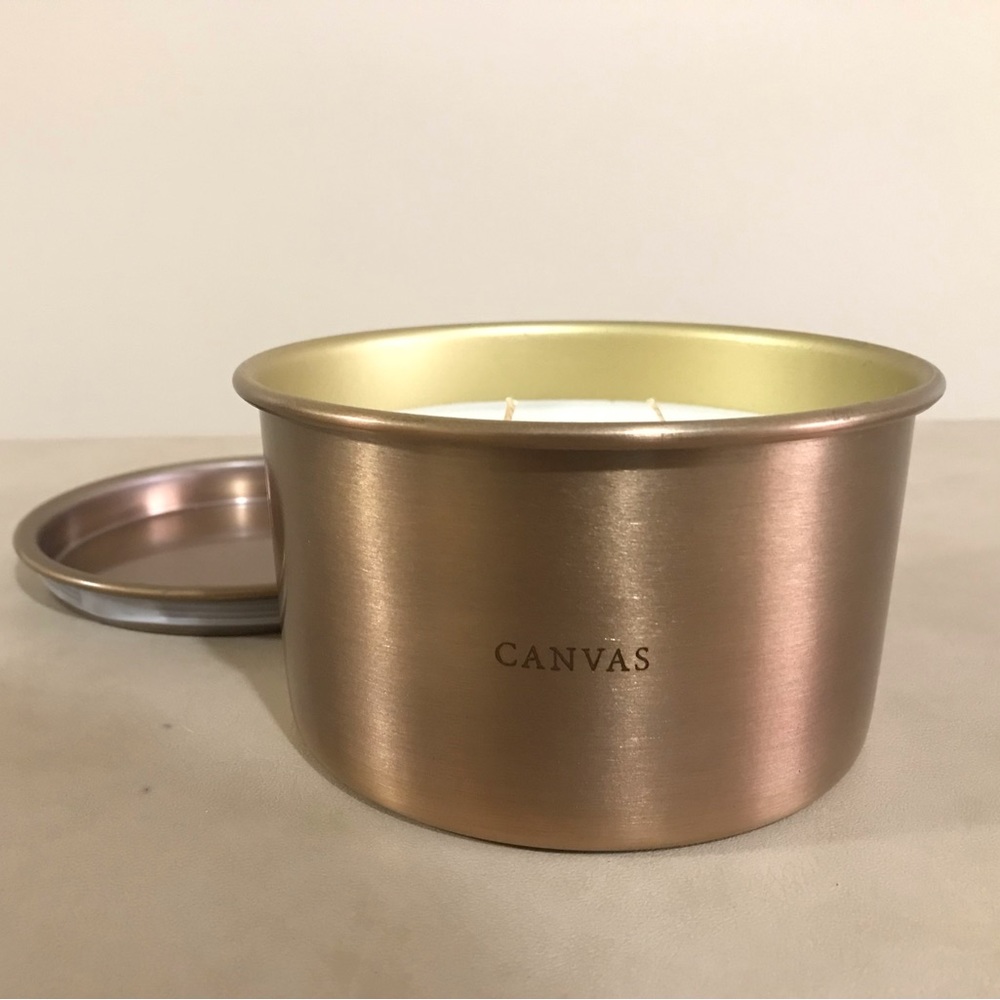 Large lidded metal candle. Warm, fresh, inviting “canvas” scent